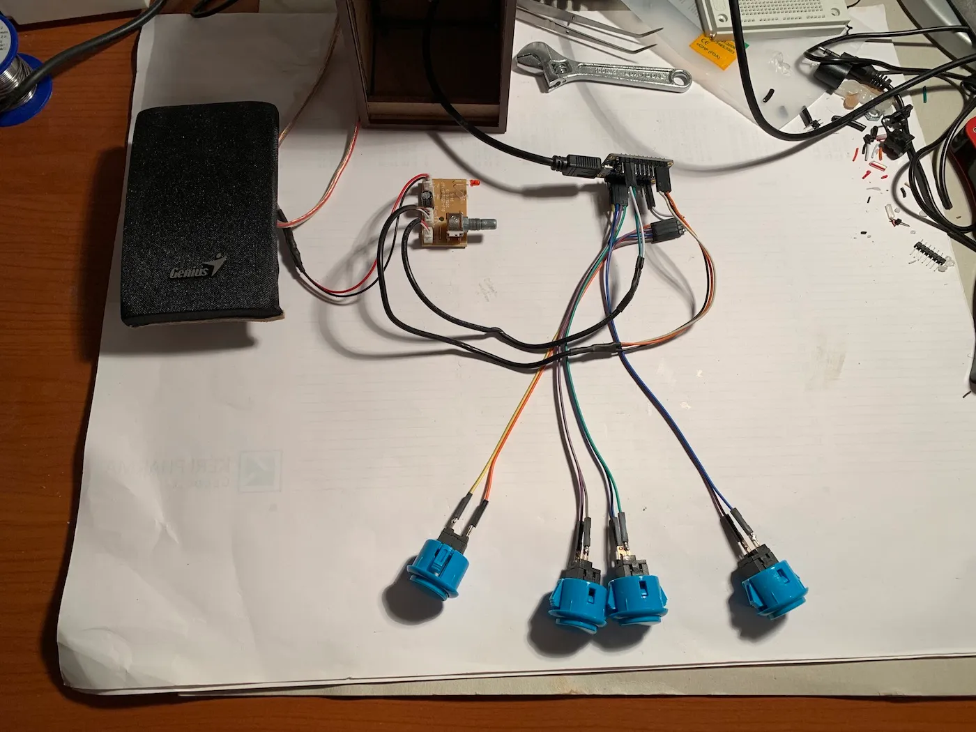 Components during the build, all four momentary switches are connected to the Adafruit board