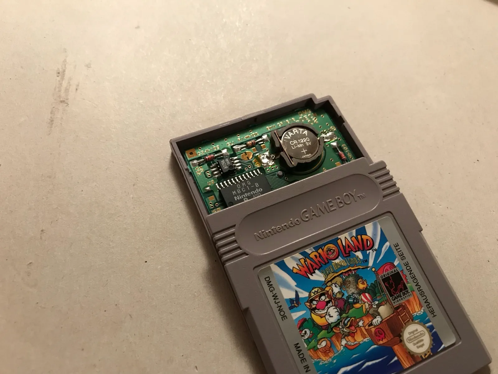 The reassembled cartridge with the new battery holder inside