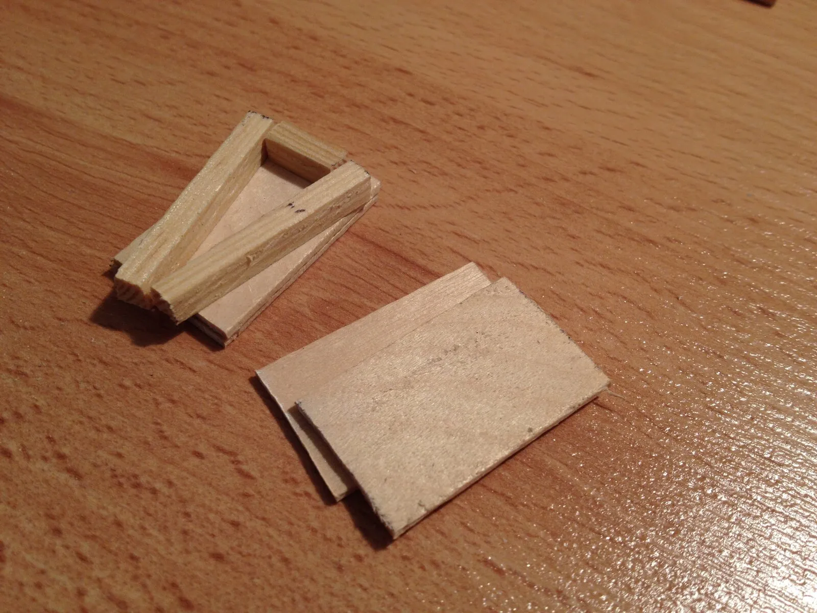 Parts of the tiny wooden enclosure for the light sensor