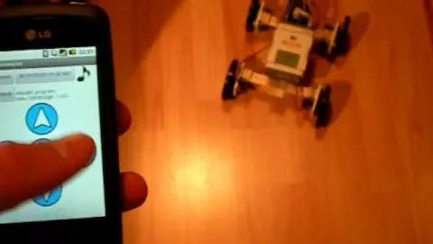 The Android app in hand with the rover on the floor in the background