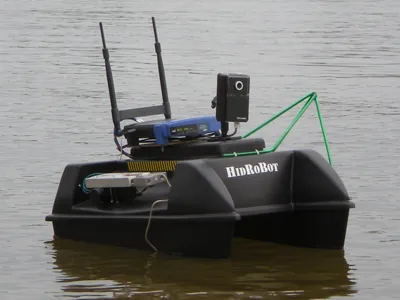 Remote controlled boat that analyses and collects water to help the work of hydrologists.