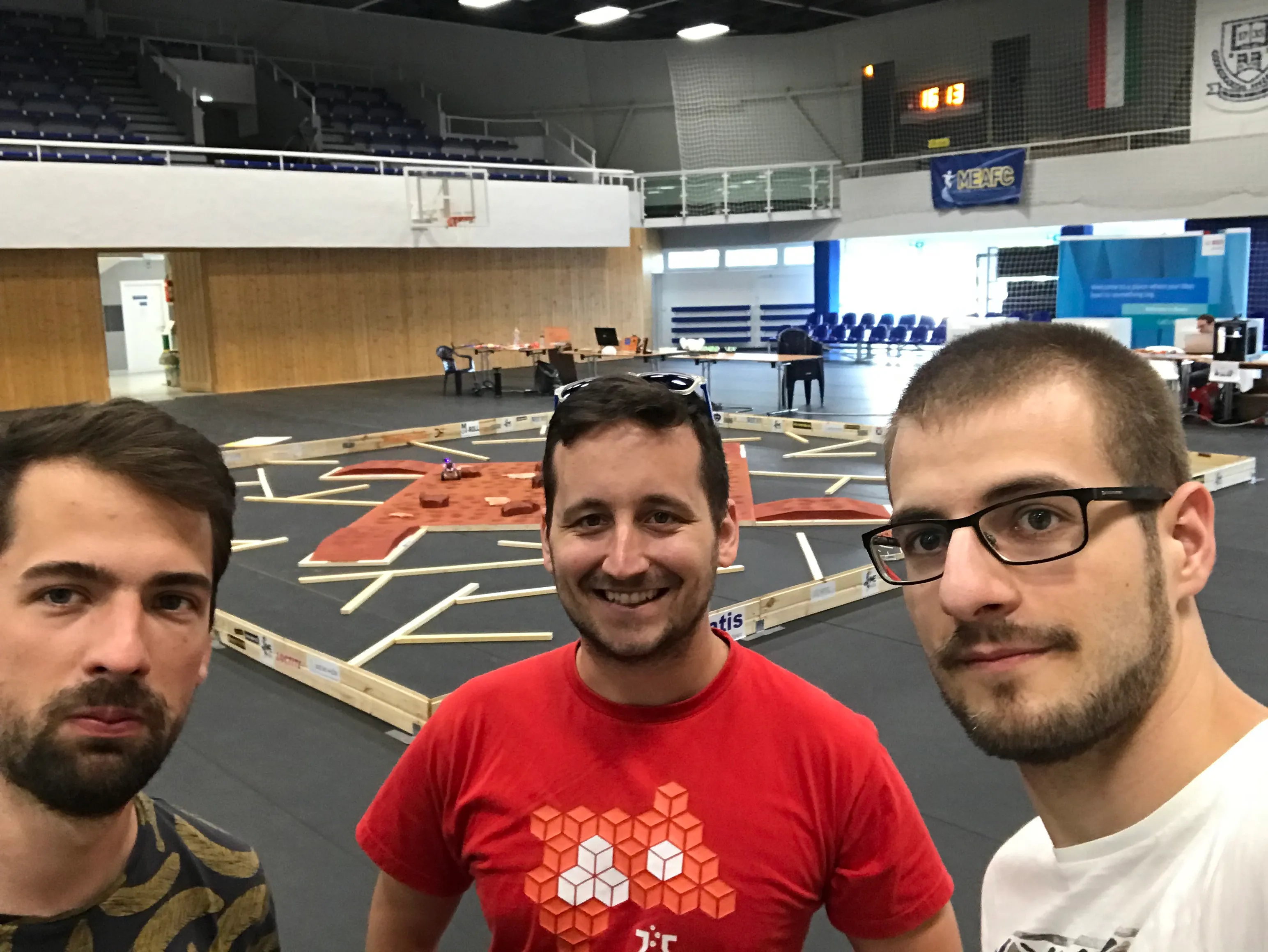 Team selfie in front of the course